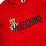 Moschino Abito tinta unita con Stampa Rosso per Neonata MDV0DP ROSSO MOSCHINO 