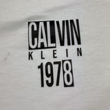 Calvin Klein T-Shirt Girocollo Tinta Unita con Stampa per Bambino IB0IB02456 BIANCO CALVIN KLEIN 