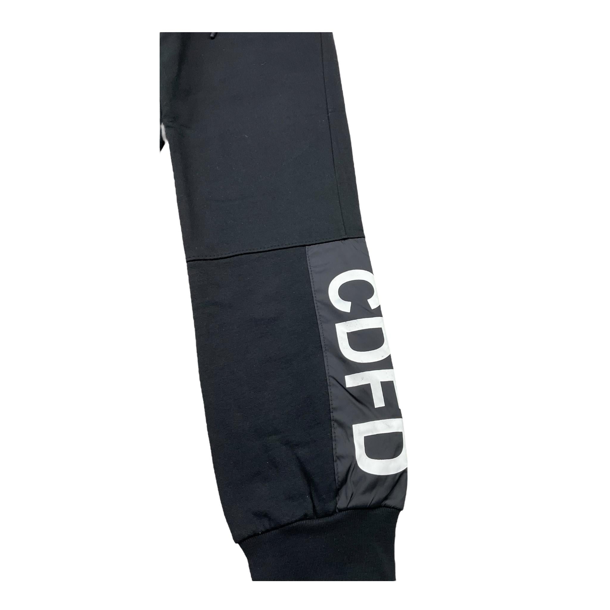 COMME DES FUCKDOWN pantalone tuta tinta unita Nero per Bambino PFCD0307J NERO COMME DES FUCKDOWN 